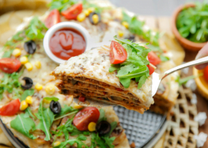 Pannenkoekentaart met gehakt en bechamelsaus