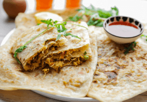 Msmen met visvulling Kookmutsjes