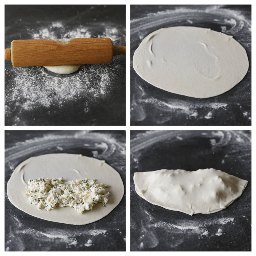 Stort het deeg op een bloem bestoven werkplek. Rol met een deegroller het deeg uit tot een ronde dunne lap van 25 cm. Vul met het feta-mengsel (64 gr) en vouw goed dicht. Herhaal de werkwijze en leg ze op een vel bakpapier.