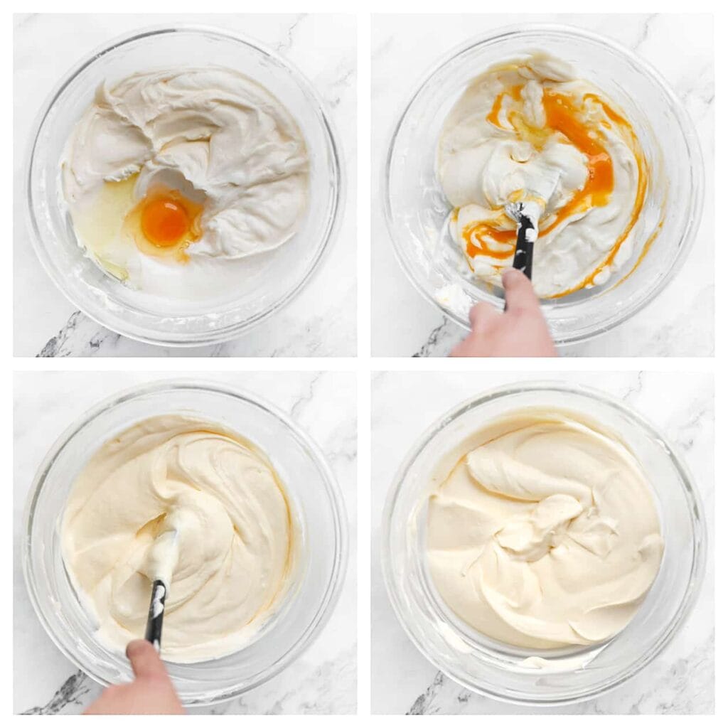 Leg de mixer weg en gebruik vanaf nu een spatel. Breek de eieren één voor één boven de kom. Spatel het ei luchtig door het cheesecakebeslag.