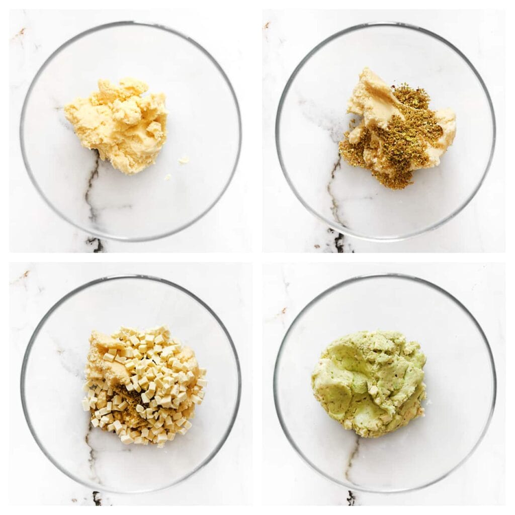 Neem een derde stuk koekjesdeeg en voeg de gehakte pistachenoten en witte chocolade toe. Kneed tot een samenhangend geheel.