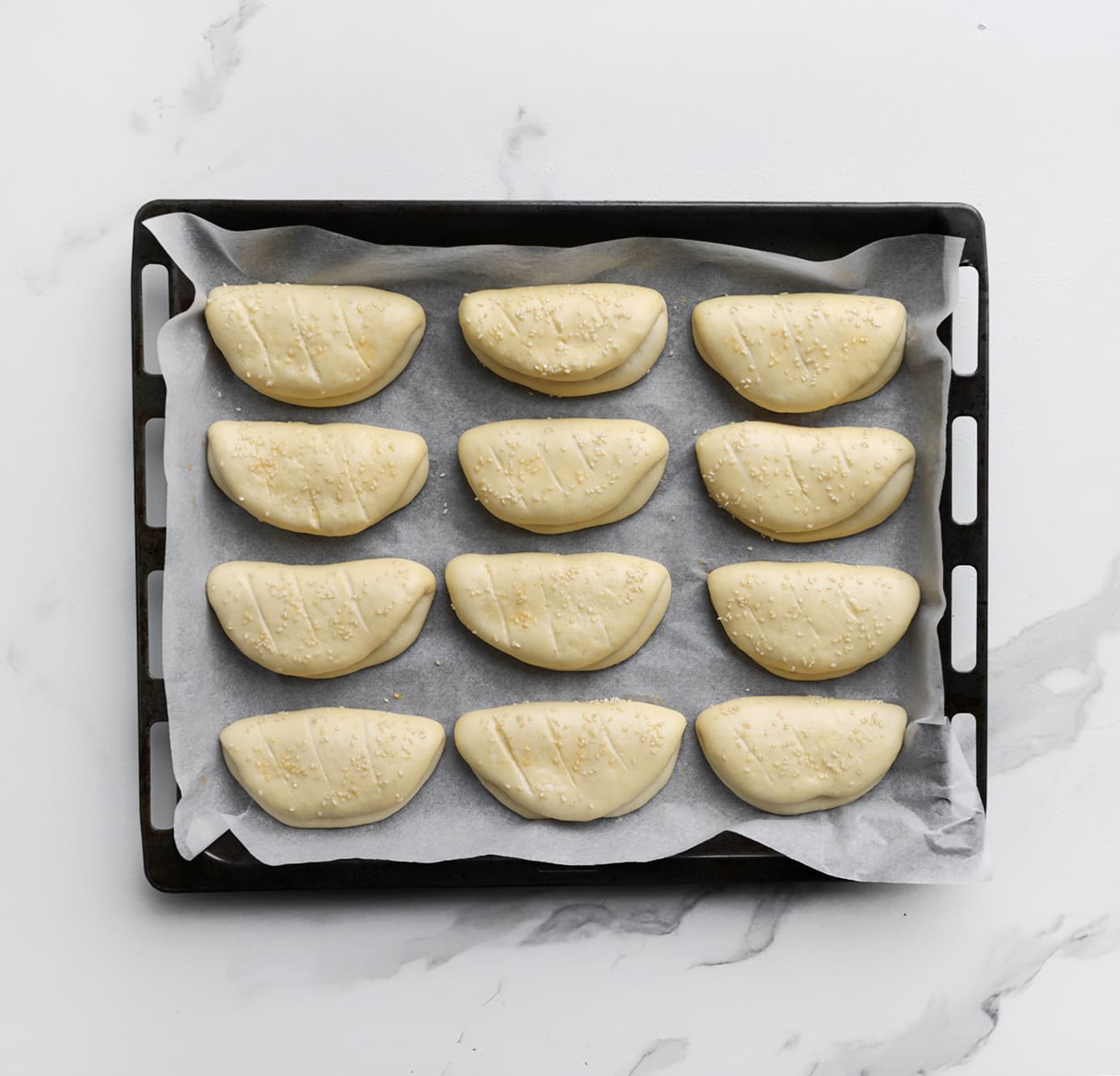 Broodjes tweede keer laten rijzen