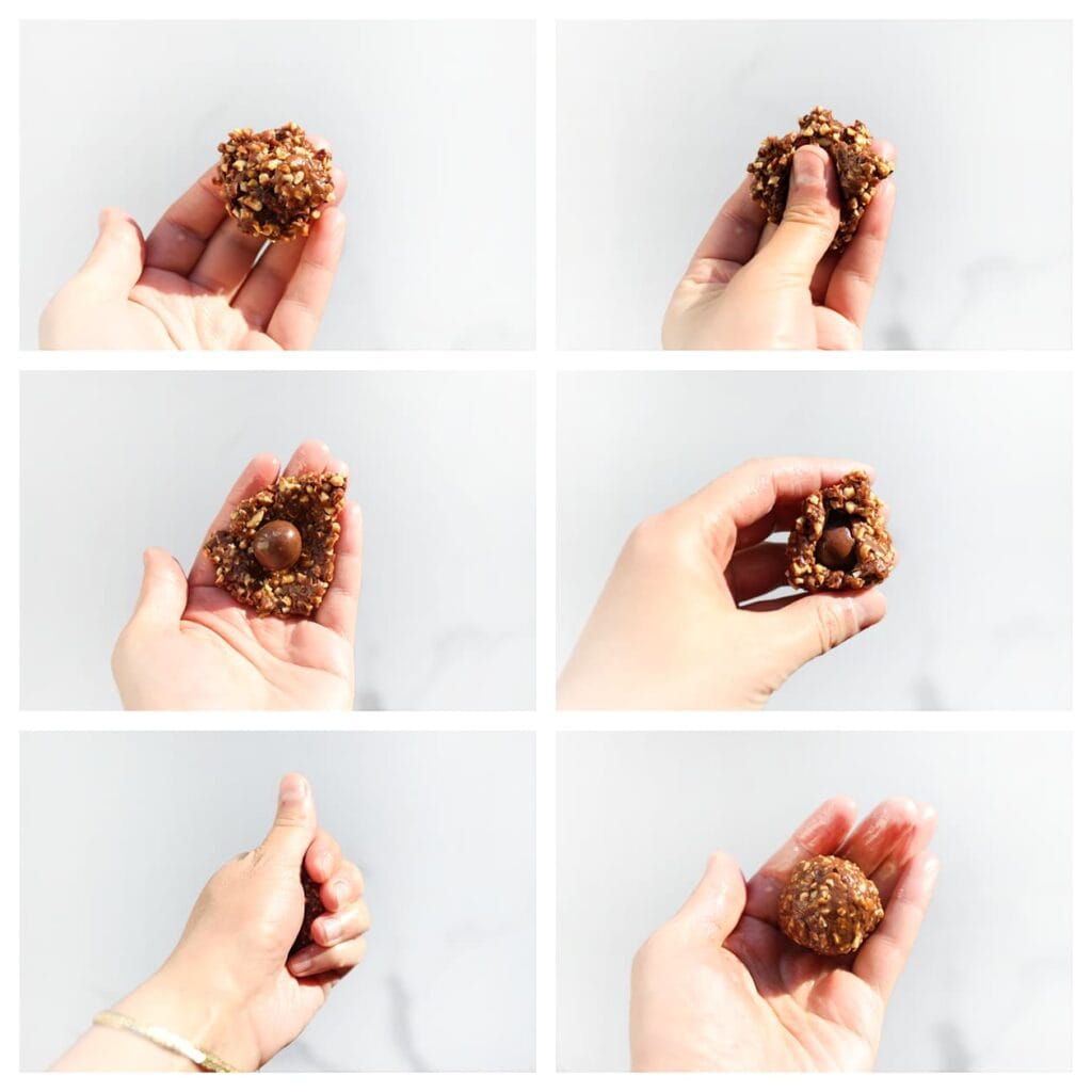 Neem ongeveer 12 gram van het chocolademengsel en druk het plat in je handpalm. Plaats een chocolade-hazelnoot in het midden en vouw het chocolademengsel eromheen. Rol met je handen tot een bol. Herhaal deze stap met de rest van het mengsel.