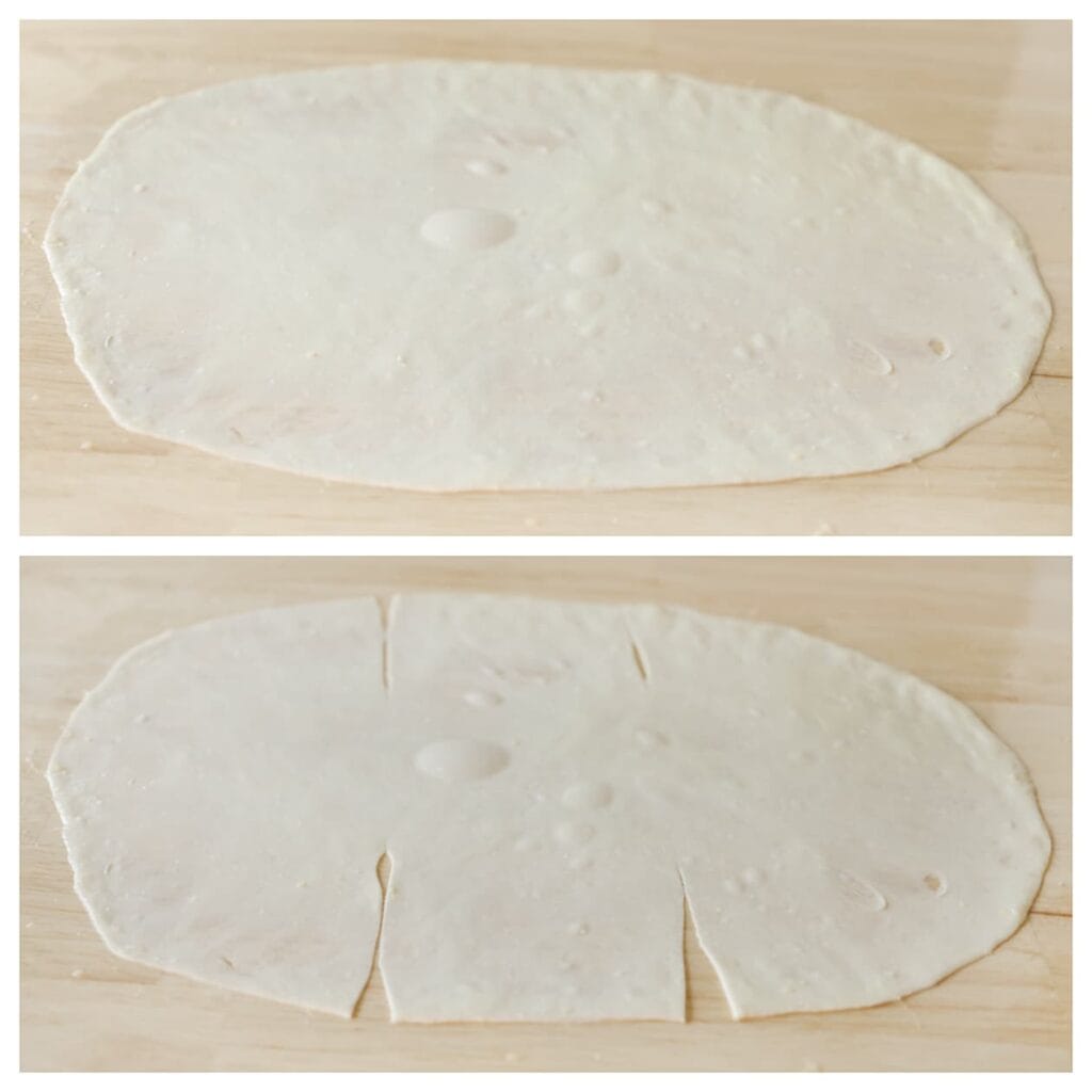 Snijd met een pizzasnijder 4 inkepingen aan de randen, zodat het deeg makkelijker gevouwen kan worden. Je verdeelt het deeg hiermee in drie delen.