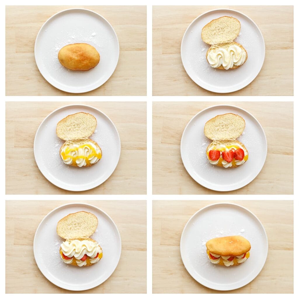 Snijd een donut horizontaal doormidden. Spuit er een laag room op, gevolgd door lemon curd, plakjes aardbei en dek af met nog een laagje room.