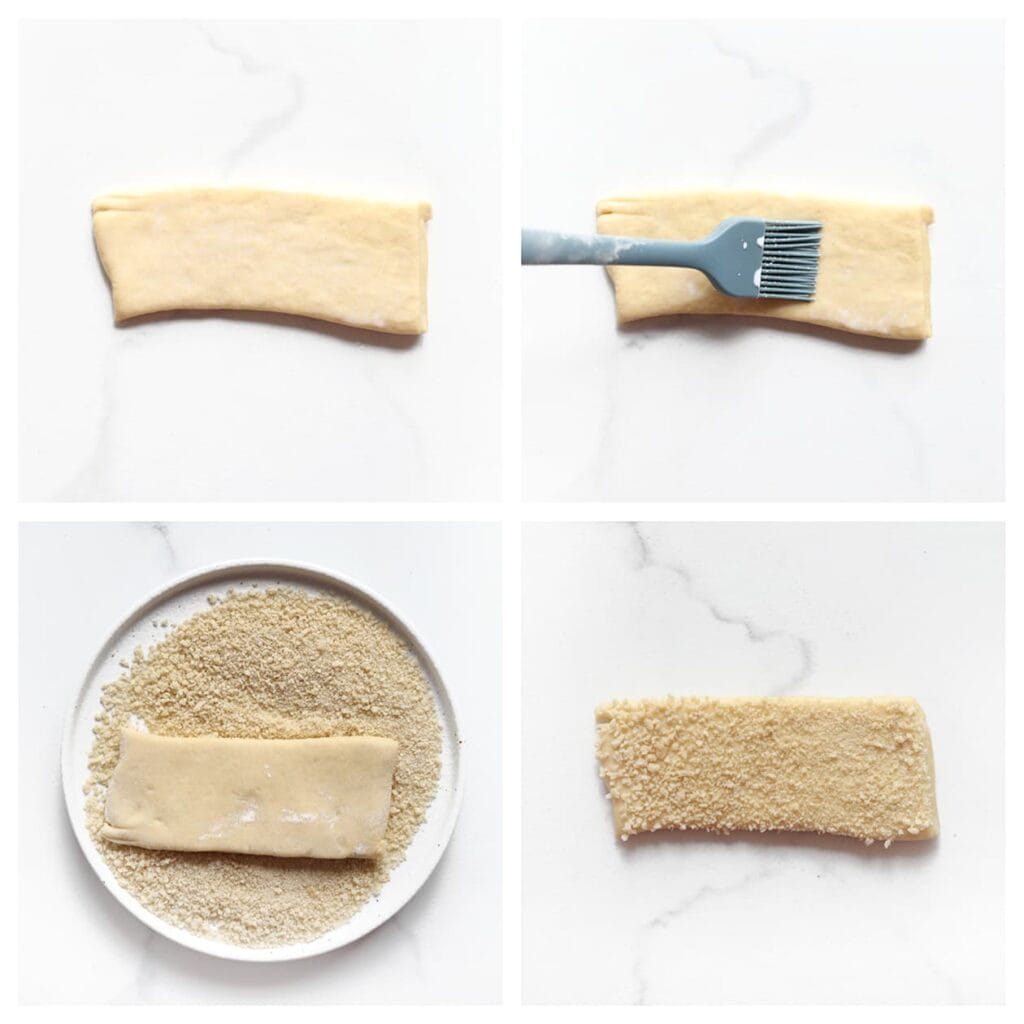 Bestrijk de bovenkant met melk en druk &eacute;&eacute;n zijde in de panko.