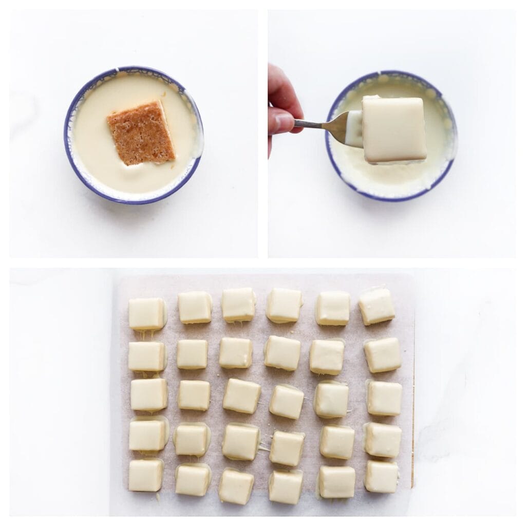 Doe de gesmolten chocolade in een diep kommetje. Haal de cheesecakeblokjes erdoorheen en leg ze op een vel bakpapier.