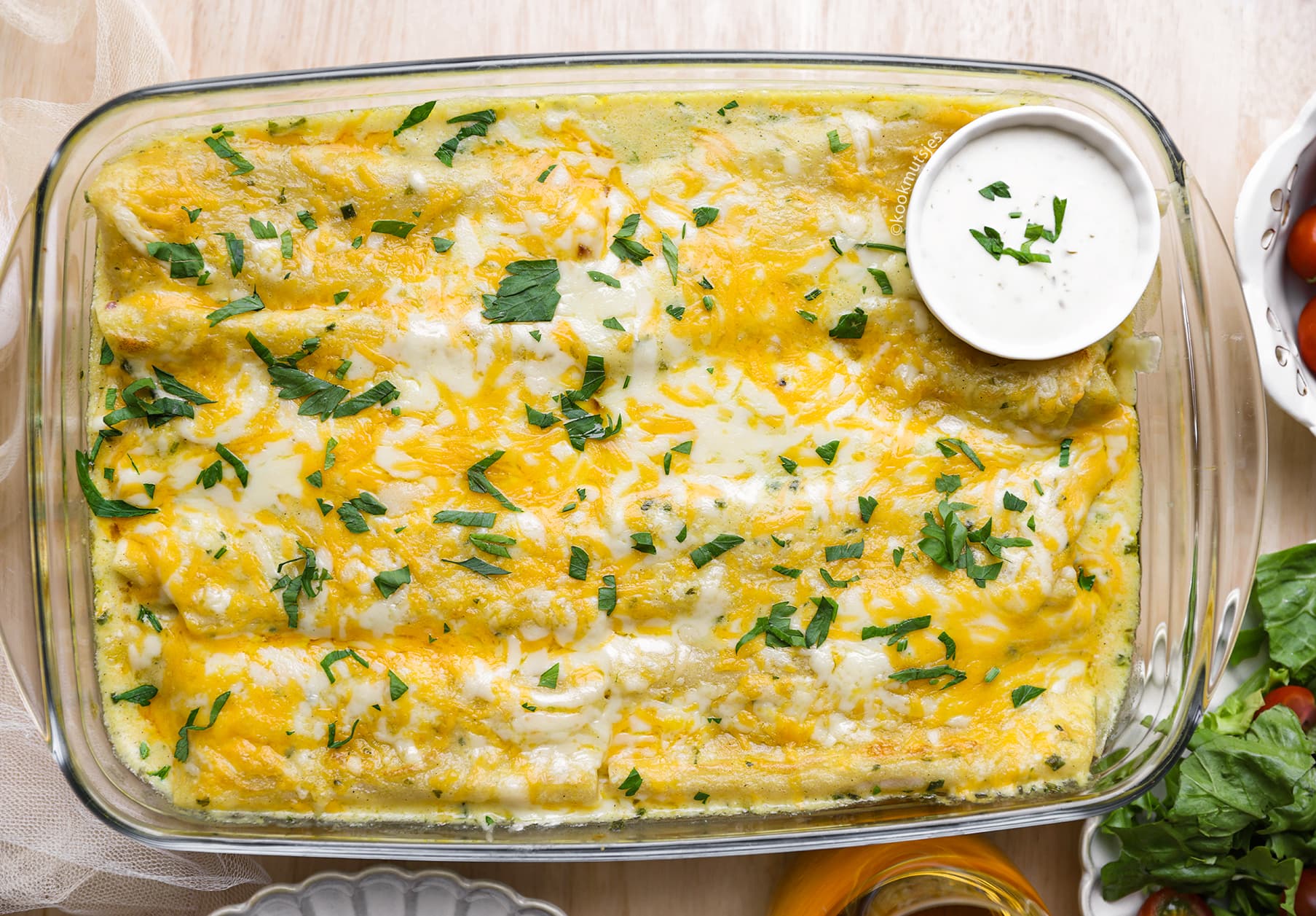 Kip Enchillades met Saus Kookmutsjes