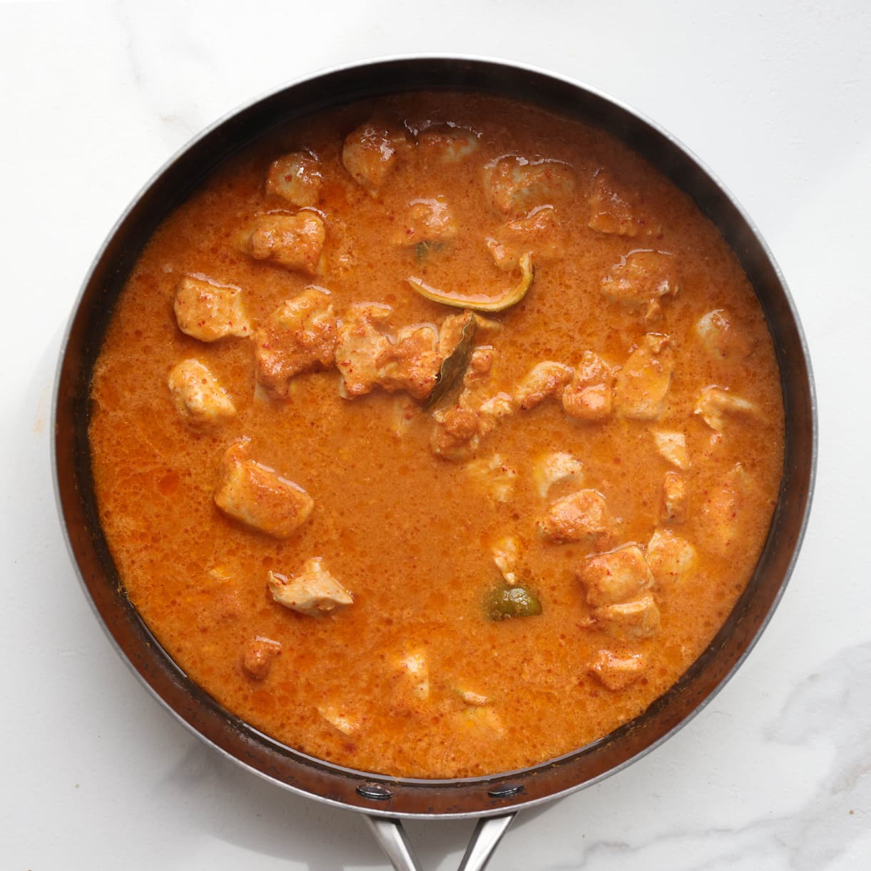 Kip in de Thaise curry koken