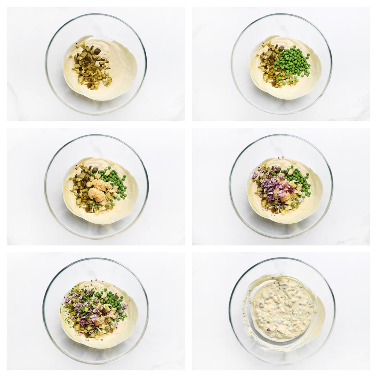 Groenten mengen door de dressing voor het maken van huzarensalade