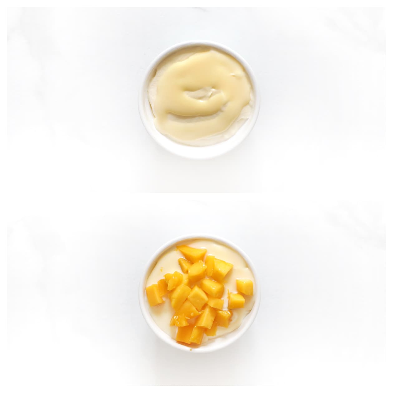 Mango tiramisu gegarneerd met gecondenseerde melk, verse mango en munt.