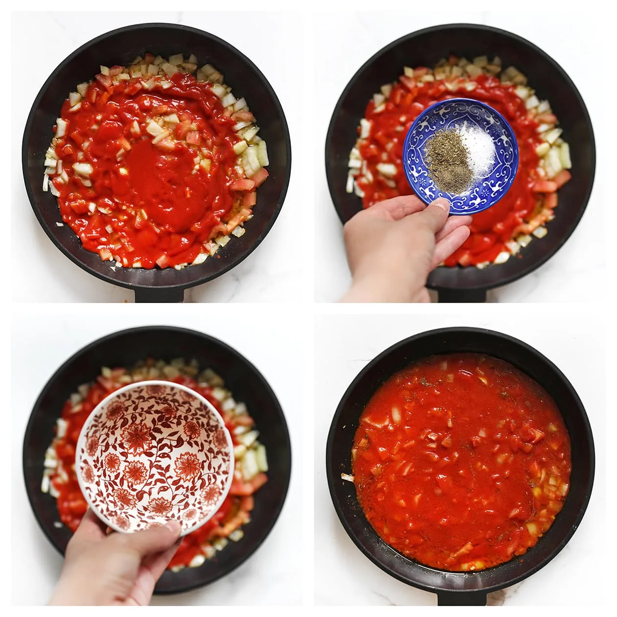 Tomatensaus met kruiden die zachtjes pruttelt in een pan