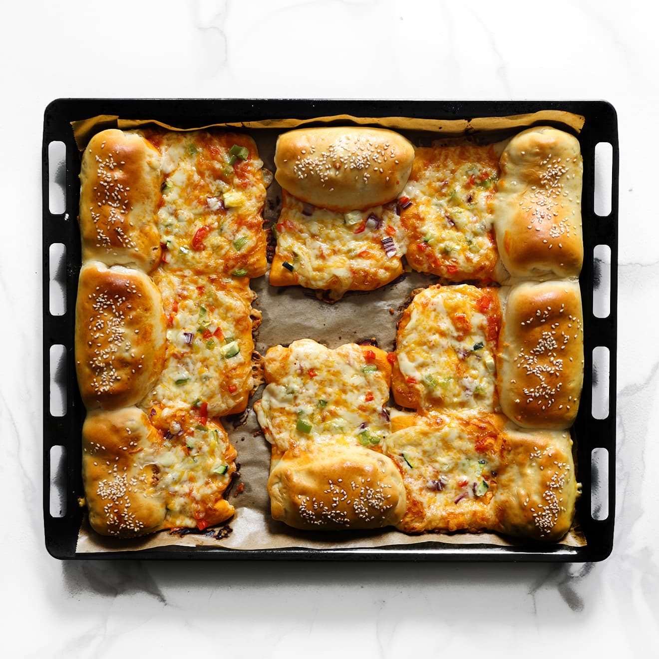 Pizzabroodjes gooudbruin bakken in de oven