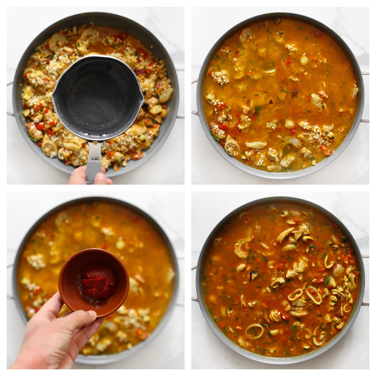Paella die rustig kookt in een pan op het fornuis