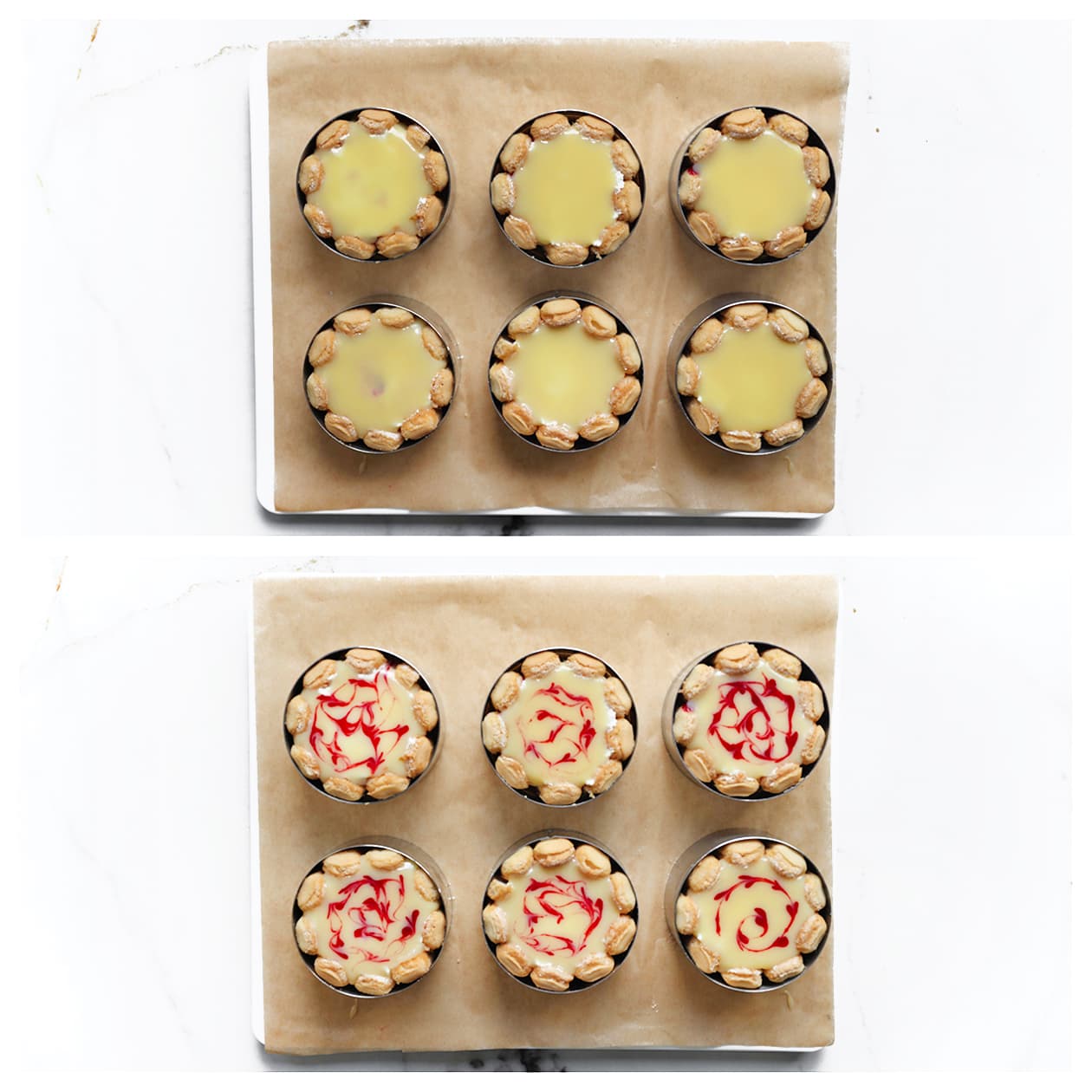 Witte chocoladeganache versierd met stipjes frambozenpuree op mini charlotte taartjes